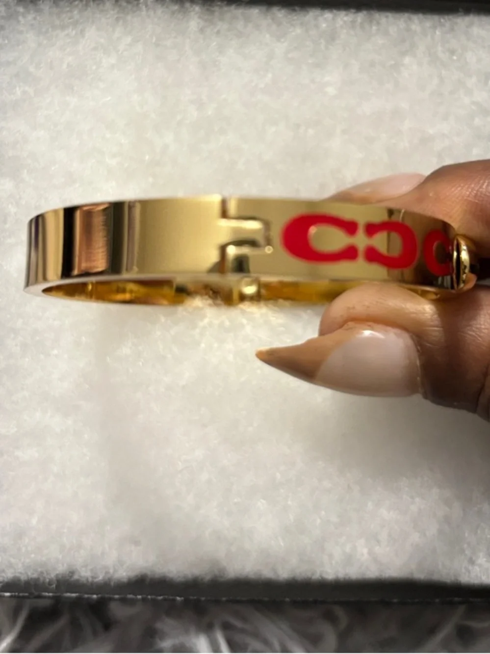 Coach Gold-Tone Cuff Bracelet with Red Signature Motif
